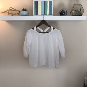 Francesca’s white blouse